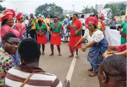  ?? — AFP ?? Supporters of Cameroonia­n President Paul Biya celebrate his re-election in Yaoundé.