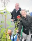  ??  ?? Green fingered Danny and Paula Carr with plant purchases