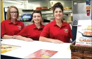  ?? TIMES photograph by Annette Beard ?? Friendly faces ready to serve customers at Pea Ridge Cafe are Meagan Davis, head waitress; Shukrie Balazoska, manager; and Mandy Jones.