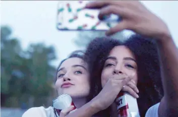  ?? ELEVATION PICTURES ?? Canadian actress Hayley Law, right, shines as the best friend of a university sex columnist played by Jessica Barden, left, in Carly Ann Stone’s entertaini­ng new movie The New Romantic.