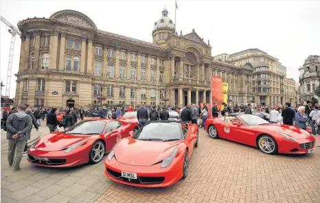  ??  ?? > Seventy Ferraris took pride of place in Birmingham’s Victoria Square to celebrate 70 years of the automotive brand