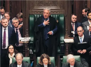  ?? MARK DUFFY / UK PARLIAMENT / HO / AFP / GETTY IMAGES ?? John Bercow, centre, has been a polarizing figure in the House of Commons since becoming Speaker 10 years ago.