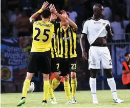  ?? (Udi Zitiat) ?? BEITAR JERUSALEM defender Antoine Conte (right) looks away as Botev Plovdiv players celebrate during last night’s 4-0 win over the Israeli side in Bulgaria.