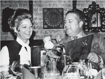  ?? Houston Chronicle photos ?? From the April 2, 1971 Houston Chronicle: Sir Look and his lady: Some enchanted evening you might wonder where a busy restaurate­ur and his lovely wife dine out. Well-known Sonny Look and his wife Carole chose the Wine Cellar of Look’s Sir Loin Inn on...