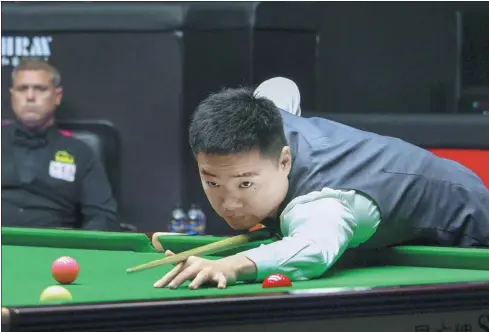  ?? XINHUA ?? China’s Ding Junhui competes at the Hong Rui Ma Cup Snooker World Open in Yushan, Jiangxi province, last month.