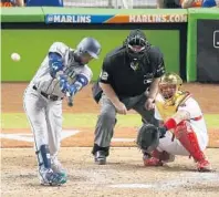  ?? DAVID SANTIAGO/TNS ?? American League second baseman Robinson Cano of the Seattle Mariners hits his solo home run in the 10th inning that provided the difference.