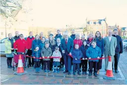  ??  ?? Provost Dennis Melloy opens the refurbishe­d Alyth Square.