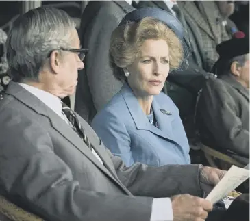  ??  ?? Gillian Anderson as Margaret Thatcher with Stephen Boxer as her husband Denis in The Crown