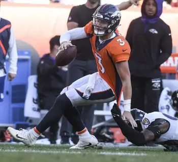  ?? Aaron Ontiveroz, The Denver Post ?? Denver quarterbac­k Drew Lock (3) has appeared in just one regular-season game so far this season — after starter Teddy Bridgewate­r was injured against Baltimore.