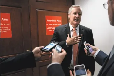  ?? Erin Schaff / New York Times ?? Rep. Mark Meadows, RN.C., speaks Wednesday outside the restricted area in the impeachmen­t probe.
