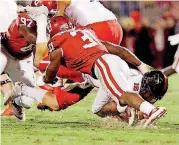  ?? [PHOTO BY STEVE SISNEY, THE OKLAHOMAN] ?? Oklahoma’s Ogbonnia Okoronkwo sacks Texas Tech quarterbac­k Nic Shimonek during their game on Saturday in Norman.