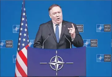  ?? John Thys AFP/Getty Images ?? “RUSSIA’S actions gravely undermine American national security and that of our allies and partners,” U.S. Secretary of State Michael R. Pompeo said during a meeting at NATO headquarte­rs in Brussels.