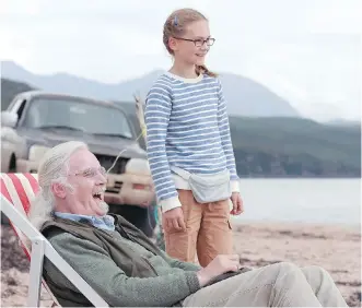  ?? ORIGIN PICTURES ?? Billy Connolly, left, stars as Gordie, a grandfathe­r who has terminal cancer. Here he shares a moment with granddaugh­ter Lottie ( Emilia Jones) in the touching family comedy, What We Did On Our Holiday.