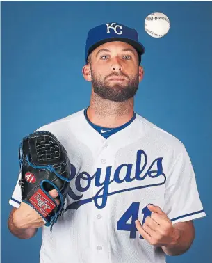  ?? CHRISTIAN PETERSEN/GETTY IMAGES ?? Kansas City pitcher Danny Duffy is a big fan of dogs, and his pet Sadie is a familiar face at Royals spring training. “As much as we save their lives, they save ours, too,” Duffy says.