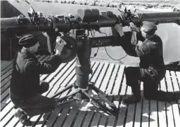  ??  ?? ■ The 4-metre rangefinde­r used by heavy flak units combined with a fire control computer made the 88mm flak gun accurate and deadly. One of the units is seen here on a Siebel Ferry.