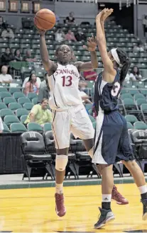  ?? Marco Garcia / Associated Press ?? Chiney Ogwumike had a season-high 25 points and 10 rebounds and was the tournament’s most valuable player.