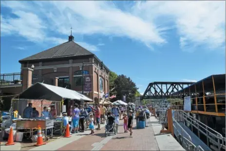  ?? RECORD FILE PHOTO ?? Event-goers enjoying the 17th annual Tugboat Roundup in Waterford.