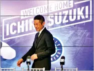  ?? AP PHOTO BY MATT YORK ?? Seattle Mariners’ Ichiro Suzuki arrives after signing a contract to a news conference at the teams’ spring training baseball complex Wednesday in Peoria, Ariz. Suzuki signed a one year deal in his return to the Mariners.