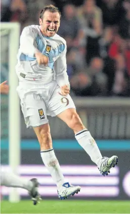  ?? Picture: PA. ?? James McFadden celebrates after scoring the winner against France at the Parc des Princes in the days that watching Scotland could still be a thrill.