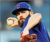  ?? AP PHOTO/MARK J.
TERRILL, FILE ?? This may 26, 2017, file photo shows Chicago Cubs starting pitcher Jake Arrieta throwing to the plate during the first inning of a baseball game against the Los Angeles Dodgers, in Los Angeles.