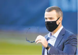  ?? BRETT CARLSEN/AP FILE ?? Buffalo Bills general manager Brandon Beane walks on the field before an Oct. 13, 2020, game against Tennessee.