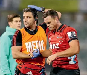  ?? GETTY IMAGES ?? An injured Israel Dagg is helped from the field during the Crusaders’ match against the Brumbies on Saturday night.