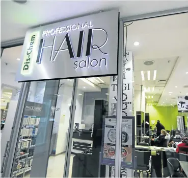  ?? Picture: Alaister Russell ?? Dis-Chem already owns nine salons like this one in Killarney, Johannesbu­rg — including one men’s barbershop.