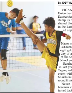  ?? JOEY MENDOZA ?? Jether Guido (12) scores against Jerry Lazaro as Pangasinan defeats Marikina in sepak takraw 15-under division of the Batang Pinoy Luzon leg in Vigan, Ilocos Sur.