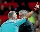  ??  ?? Referee Jonathan Moss sends Manchester United manager Jose Mourinho to the stands.