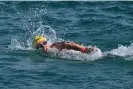  ?? Photograph: Xinhua/REX/Shuttersto­ck ?? Chelsea Gubecka of Australia competes in the mixed 4x1500m relay open water final.