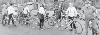  ??  ?? Victoria Grandmothe­rs for Africa members take a break during Day 2 of last year’s ride from Campbell River to Victoria. This year’s ride is in September, but training rides start on April 16.