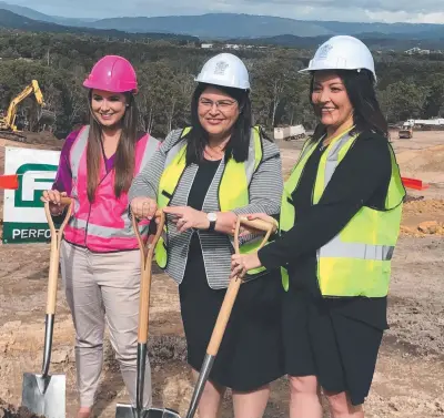  ??  ?? Turning the first sod yesterday on the Gold Coast's newest school in Coomera are (from left) Member for Gaven Meaghan Scanlon, Education Minister Grace Grace and foundation principal Kym Amor.