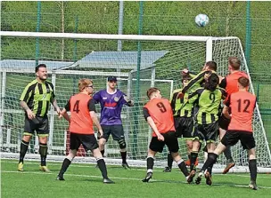  ?? ?? ● Action from Moston Brook fourths v Altrincham Hale Reserves (in red)