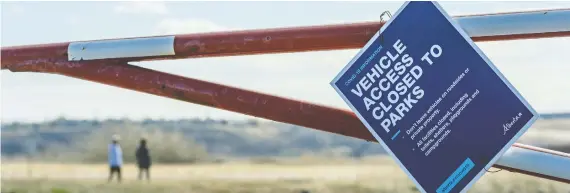  ?? AZIN GHAFFARI ?? Parking lots at Fish Creek Provincial Park were closed Friday but were expected to be open by Saturday. Conservati­on officers will be watching out for social distancing.