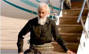  ?? AFP ?? An Oman TV video grab shows Thomas Uzhunnalil disembarki­ng from a Royal Air Force of Oman plane in the capital Muscat following his release from militants in Yemen. —