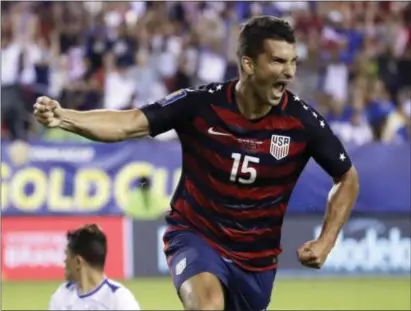  ?? MATT ROURKE — THE ASSOCIATED PRESS ?? United States’ defender Eric Lichaj (15), who scored in the first half of Wednesday’s 2-0 win over El Salvador, is hoping a solid showing in the Gold Cup will land him on the Americans’ World Cup roster.