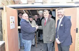  ??  ?? Men in Sheds Macclesfie­ld Co-ordinator John Hitchen, MP David Rutley, Damon Taylor and supporters with the new shed