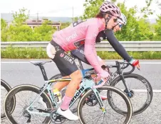  ?? AFP photos — ?? Team Jumbo rider Slovenia’s Primoz Roglic, in the pink jersey of the overall leader, wears a plaster on his backside following an injury during a crash during stage six of the 102nd Tour of Italy in this May 16, 2019 file photo.