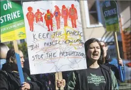  ?? Jeff Chiu Associated Press ?? TEACHER Estefana Ramos at the rally. Oakland teacher salaries are among the lowest in the Bay Area, where rents and home prices have risen dramatical­ly.