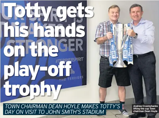  ??  ?? Andrew Cruickshan­ks lifting the cup Town chairman Dean Hoyle