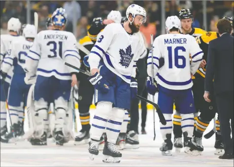  ?? — GETTY IMAGES ?? Defenceman Jake Muzzin reacts to the Maple Leafs losing to the Boston Bruins in the playoffs last season. Muzzin, who was acquired from Los Angeles in late January, says he’s itching for this campaign to get under way.