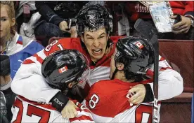  ?? CHRIS O’MEARA / AP FILE ?? Feb. 28, 2010: Sidney Crosby scores the winning goal in overtime to give Canada a 3-2 victory over the U.S. in the final event of the Vancouver Olympics. Canada earns its 14th gold medal, the most by any country at any Winter Olympics. The American silver is the 37th medal won by the U.S. at these games, the most by any country at any Winter Olympics. The U.S. wins the medals race for the first time since 1932.