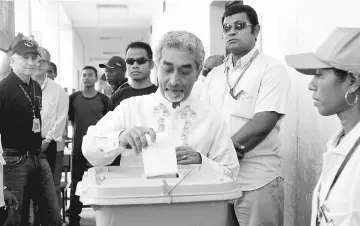  ??  ?? File photo shows Alkatiri casting his vote during the parliament­ary elections in Dili. — Reuters photo