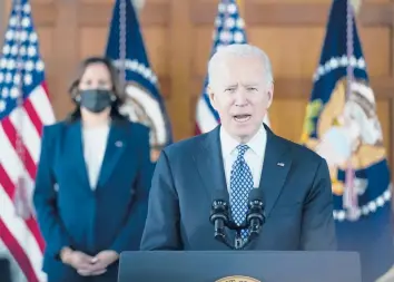  ?? PATRICK SEMANSKY/AP ?? President Joe Biden speaks after meeting with Asian American state legislator­s and other community leaders at Emory University in Atlanta on Friday as Vice President Kamala Harris listens.