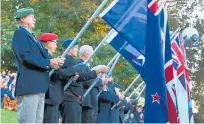  ?? Photo / Tania Whyte ?? Flag bearers at the cenotaph yesterday.