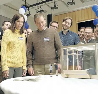  ?? PARAMOUNT PICTURES ?? Kristen Wiig, left, and Matt Damon, right, appear in a scene from Downsizing. Downsizing opens across Canada on Friday.