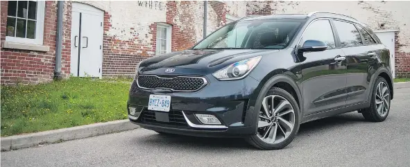  ?? NICK TRAGIANIS/DRIVING.CA ?? The 2017 Kia Niro comes loaded with more features and has better fuel economy than the Prius, at a lower price.