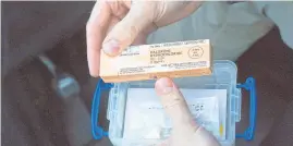  ?? JOSHUA MCKERROW/ CAPITAL GAZETTE ?? Annapolis Police Cpl. Jon- Paul Hipsky shows the Narcan kit he carries. The Citizen Narcan program aims to distribute more doses and training to the community.