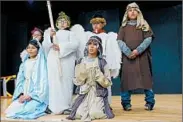  ??  ?? Children act in a 2015 Las Posadas ceremony at Mission San Buenaventu­ra in Ventura, Calif.