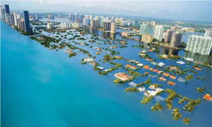  ?? Photograph: Nickolay Lamm/Courtesy Climate Central ?? A potential scenario of future sea level rise in South Beach, Miami, Florida, with a global temperatur­e rise of 2C.